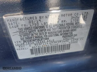 2019 Nissan Versa Sedan SV with VIN 3N1CN7AP1KL877494, listed as a IAAI auction lot 41692194 with 121,323 mi miles. Bid and sale history available at carsss.com. Image 9.