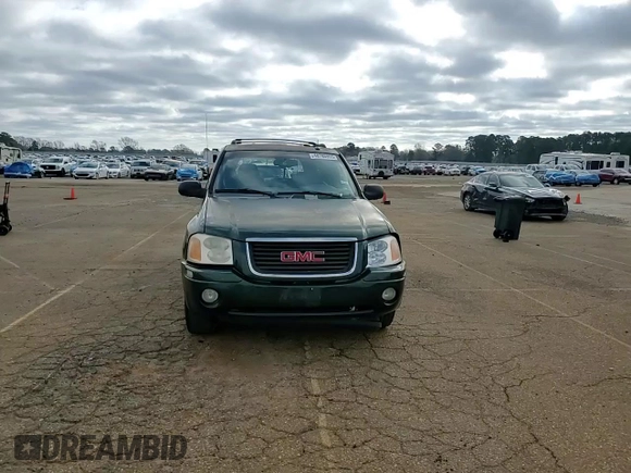 2004 GMC Envoy SLE with VIN 1GKDS13SX42234675, listed as a Copart auction lot 48780955 with 217,790 mi miles and Salvage Title. Bid and sale history available at carsss.com. Image 11.