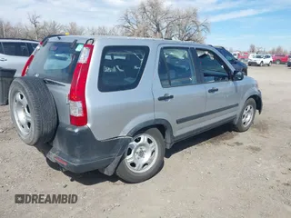 2006 Honda CR-V LX with VIN JHLRD785X6C057434, listed as a IAAI auction lot 41881971 with 210,658 mi miles and . Bid and sale history available at carsss.com. Image 4.