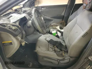 2012 Hyundai Accent GLS z VIN KMHCU4AE0CU225272, wystawiony jako Copart lot #49724155 z przebiegiem Nie podano mil oraz Szkoda całkowita • Salvage title. Historia ofert i sprzedaży dostępna na DreamBid. Obrazek 7.