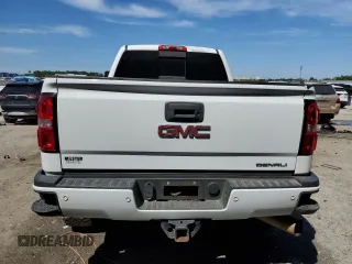 2016 GMC Sierra 2500HD Denali z VIN 1GT12UE84GF106026, wystawiony jako Copart lot #50755335 z przebiegiem 127 039 mil mil oraz Szkoda całkowita • Salvage title. Historia ofert i sprzedaży dostępna na DreamBid. Obrazek 6.
