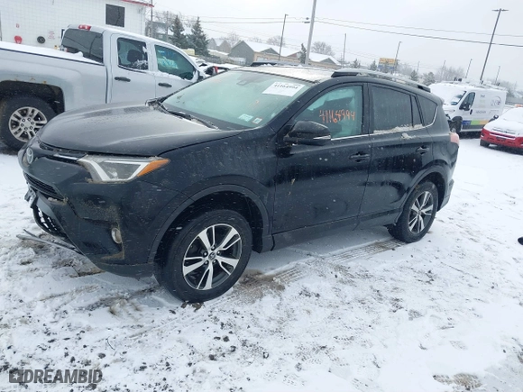 2018 Toyota RAV4 XLE with VIN 2T3RFREV8JW851250, listed as a IAAI auction lot 41164994 with 63,005 mi miles. Bid and sale history available at carsss.com. Image 17.