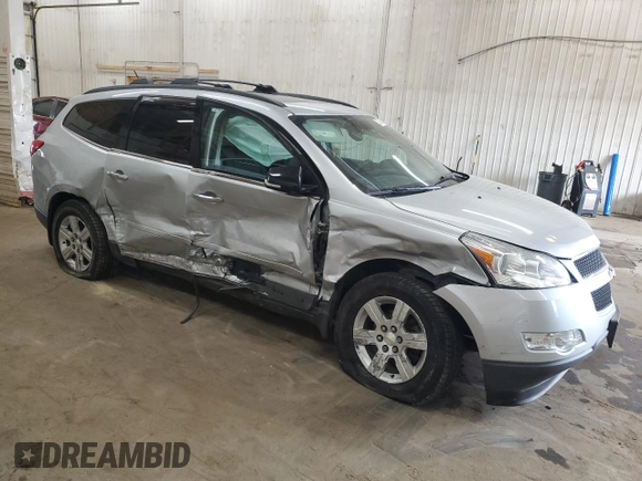 2012 Chevrolet Traverse 1LT z VIN 1GNKVGEDXCJ185307, wystawiony jako Copart lot #52724985 z przebiegiem 167 192 mil mil oraz Szkoda całkowita • Salvage title. Historia ofert i sprzedaży dostępna na DreamBid. Obrazek 4.