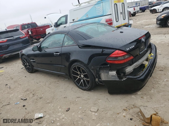 2009 Mercedes-Benz SL-Class V8 with VIN WDBSK71F39F152619, listed as a Copart auction lot 43771145 with 106,402 mi miles and Salvage Title. Bid and sale history available at carsss.com. Image 2.