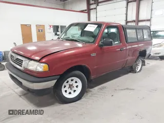 1999 Mazda B-Series Truck SX with VIN 4F4YR12C8XTM08476, listed as a IAAI auction lot 41864144 with 187,847 mi miles and . Bid and sale history available at DreamBid. Image 2.