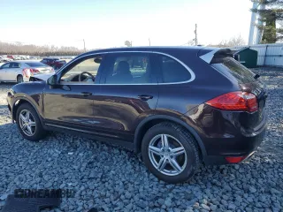 2014 Porsche Cayenne z VIN WP1AA2A22ELA96960, wystawiony jako Copart lot #48517675 z przebiegiem Nie podano mil oraz Szkody całkowita. Historia ofert i sprzedaży dostępna na DreamBid. Obrazek 2.