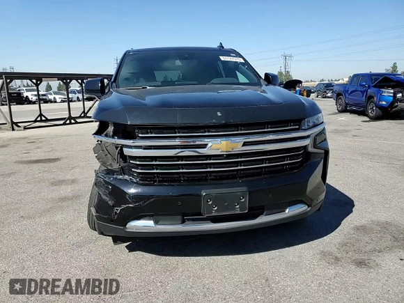 2023 Chevrolet Tahoe LT with VIN 1GNSKNKD5PR262044, listed as a Copart auction lot 63127975 with 34,333 mi miles and Salvage title. Bid and sale history available at DreamBid. Image 14.