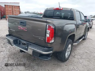 2016 GMC Canyon 2WD SLE with VIN 1GTG5CE34G1154106, listed as a IAAI auction lot 41451107 with 245,087 mi miles. Bid and sale history available at carsss.com. Image 4.