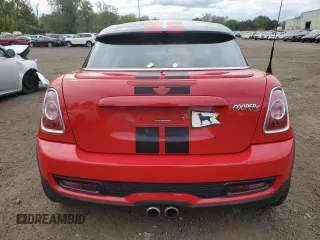 2014 MINI Coupe S z VIN WMWSX3C59ET409176, wystawiony jako Copart lot #72736864 z przebiegiem Nie podano mil oraz Szkody całkowita. Historia ofert i sprzedaży dostępna na DreamBid. Obrazek 6.