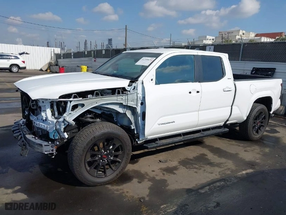 2024 Toyota Tacoma 2WD SR5 with VIN 3TMKB5FN8RM014659, listed as a IAAI auction lot 41399631 with 5,186 mi miles. Bid and sale history available at carsss.com. Image 14.