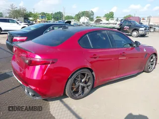 2023 Alfa Romeo Giulia Quadrifoglio with VIN ZARFAMEVXP7671394, listed as a IAAI auction lot 42758075 with Not provided miles and . Bid and sale history available at DreamBid. Image 4.