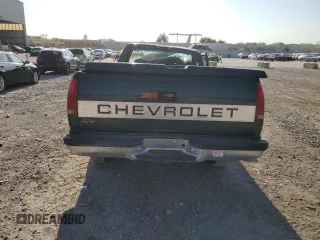 1996 Chevrolet Silverado 1500 with VIN 1GCEC14M6TZ154941, listed as a Copart auction lot 66361154 with 124,631 mi miles and Salvage Title. Bid and sale history available at DreamBid. Image 6.