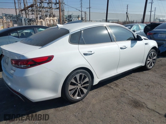 2016 Kia Optima SX Turbo with VIN 5XXGW4L2XGG043934, listed as a IAAI auction lot 40451940 with 86,386 mi miles and . Bid and sale history available at carsss.com. Image 4.