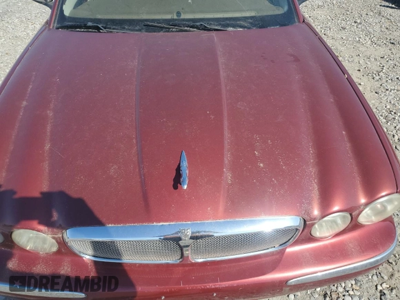 2005 Jaguar XJ Vanden Plas z VIN SAJWA82C75SG33074, wystawiony jako Copart lot #48725755 z przebiegiem 129 817 mil mil oraz Czysty tytuł • Clean title. Historia ofert i sprzedaży dostępna na DreamBid. Obrazek 11.