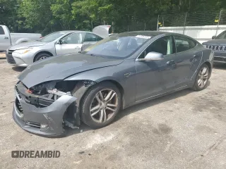 2013 Tesla Model S with VIN 5YJSA1DN7DFP17004, listed as a Copart auction lot 54836355 with 90,902 mi miles and Salvage title. Bid and sale history available at DreamBid. Image 1.
