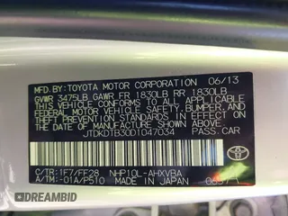 2013 Toyota Prius One with VIN JTDKDTB30D1047034, listed as a IAAI auction lot 42143557 with 186,866 mi miles. Bid and sale history available at carsss.com. Image 9.