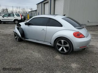 2012 Volkswagen Beetle 2.0T Turbo w/Sun/Sound PZEV with VIN 3VWVA7AT8CM628164, listed as a Copart auction lot 85227914 with 89,403 mi miles and Salvage Title. Bid and sale history available at carsss.com. Image 2.