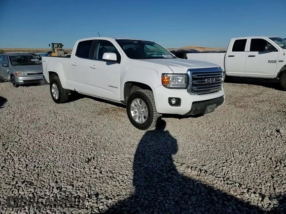 2015 GMC Canyon 4WD SLE with VIN 1GTG6BE32F1185781, listed as a Copart auction lot 79688404 with 199,781 mi miles and Salvage Title. Bid and sale history available at carsss.com. Image 10.