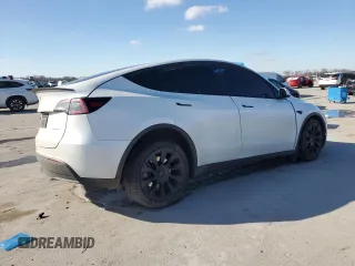2023 Tesla Model Y Long Range with VIN 7SAYGAEE3PF767171, listed as a Copart auction lot 46057645 with Not Provided miles and Salvage Title. Bid and sale history available at DreamBid. Image 3.