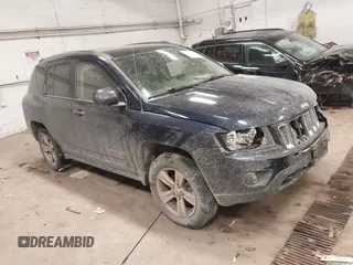 2014 Jeep Compass Latitude with VIN 1C4NJDEB4ED884111, listed as a IAAI auction lot 41346485 with 142,446 mi miles. Bid and sale history available at carsss.com. Image 1.