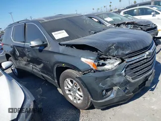 2019 Chevrolet Traverse LT Cloth z VIN 1GNERGKW5KJ169991, wystawiony jako IAAI lot #42640699 z przebiegiem 101 590 mil mil oraz . Historia ofert i sprzedaży dostępna na DreamBid. Obrazek 1.