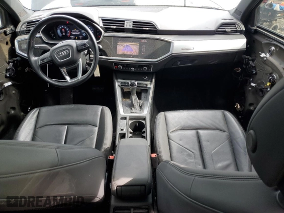 2020 Audi Q3 Premium with VIN WA1AECF30L1025756, listed as a Copart auction lot 50295125 with 77,389 mi miles and Salvage title. Bid and sale history available at DreamBid. Image 8.