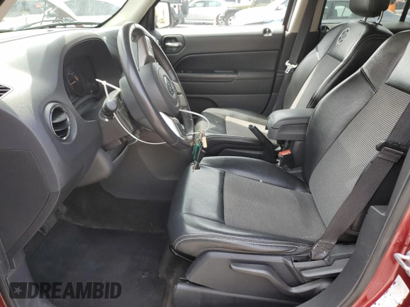 2014 Jeep Patriot Latitude with VIN 1C4NJRFB0ED658983, listed as a Copart auction lot 55024685 with 96,457 mi miles and Salvage Title. Bid and sale history available at carsss.com. Image 7.