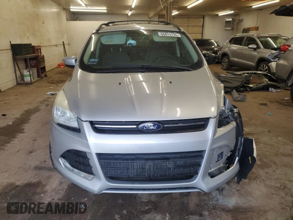 2013 Ford Escape SE z VIN 1FMCU9G90DUA34122, wystawiony jako Copart lot #60875735 z przebiegiem 174 118 mil mil oraz Szkoda całkowita • Salvage title. Historia ofert i sprzedaży dostępna na DreamBid. Obrazek 5.
