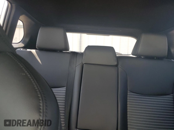 2023 Toyota Corolla Cross Hybrid S with VIN 7MUFBABG5PV008595, listed as a Copart auction lot 60002585 with 9,052 mi miles and Salvage title. Bid and sale history available at DreamBid. Image 10.