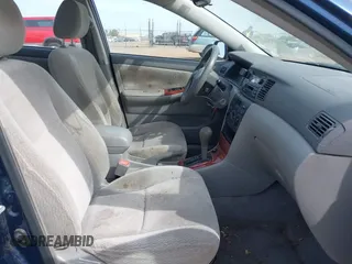 2004 Toyota Corolla CE with VIN JTDBR38E042034109, listed as a IAAI auction lot 42054614 with 162,116 mi miles. Bid and sale history available at carsss.com. Image 5.