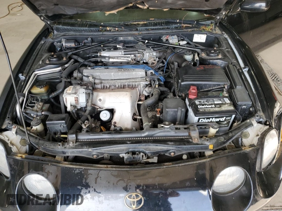 1997 Toyota Celica GT z VIN JT5FG02T3V0041206, wystawiony jako Copart lot #54601725 z przebiegiem 198 685 mil mil oraz Szkody całkowita. Historia ofert i sprzedaży dostępna na DreamBid. Obrazek 11.