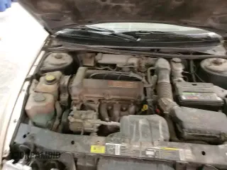 1999 Saturn SL with VIN 1G8ZK5278XZ269792, listed as a Copart auction lot 48773395 with 159,506 mi miles and Salvage title. Bid and sale history available at DreamBid. Image 16.