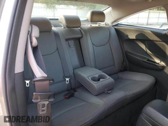 2014 Hyundai Elantra Coupe with VIN KMHDH6AH4EU026680, listed as a Copart auction lot 77350814 with 104,828 mi miles and Salvage Title. Bid and sale history available at carsss.com. Image 11.