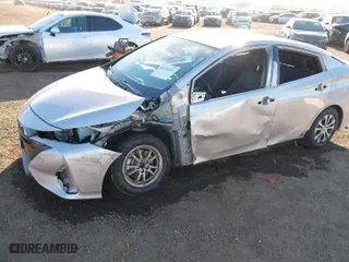 2021 Toyota Prius Prime LE with VIN JTDKAMFP1M3178179, listed as a IAAI auction lot 41233411 with 83,035 mi miles. Bid and sale history available at carsss.com. Image 6.