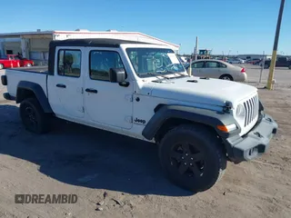 2021 Jeep Gladiator Willys with VIN 1C6HJTAG1ML619781, listed as a IAAI auction lot 41738452 with 62,400 mi miles and . Bid and sale history available at DreamBid. Image 1.
