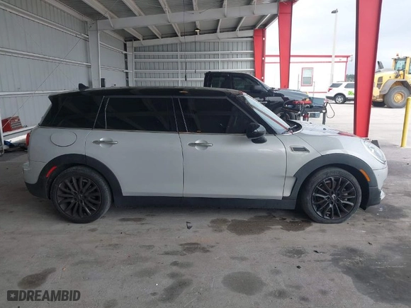 2019 MINI Cooper Clubman with VIN WMWLN5C53K2E34830, listed as a IAAI auction lot 41419983 with 64,716 mi miles. Bid and sale history available at carsss.com. Image 13.