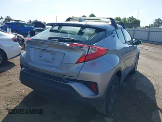 2019 Toyota C-HR XLE with VIN JTNKHMBX9K1044591, listed as a IAAI auction lot 42012934 with 139,858 mi miles and . Bid and sale history available at DreamBid. Image 4.
