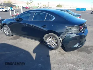 2021 Mazda 3 S z VIN JM1BPAAL8M1321402, wystawiony jako IAAI lot #41693911 z przebiegiem 35 144 mil mil oraz . Historia ofert i sprzedaży dostępna na DreamBid. Obrazek 3.