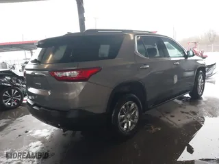 2019 Chevrolet Traverse LT Cloth with VIN 1GNEVGKW1KJ135509, listed as a IAAI auction lot 41283639 with 77,327 mi miles. Bid and sale history available at carsss.com. Image 4.