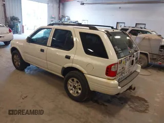 2004 Isuzu Rodeo S with VIN 4S2CK58W244313115, listed as a IAAI auction lot 42147475 with 186,594 mi miles and . Bid and sale history available at DreamBid. Image 3.