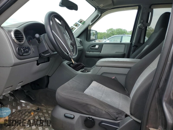 2004 Ford Expedition Special Service with VIN 1FMPU16L74LA55782, listed as a Copart auction lot 58326715 with 68,653 mi miles and Salvage title. Bid and sale history available at DreamBid. Image 7.