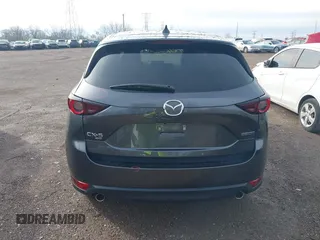 2020 Mazda CX-5 Touring with VIN JM3KFBCM8L0863951, listed as a IAAI auction lot 41921635 with 88,629 mi miles. Bid and sale history available at carsss.com. Image 16.