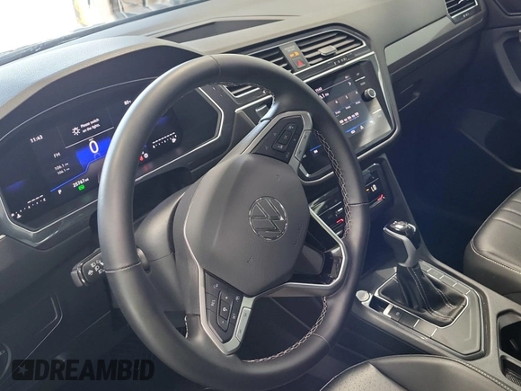2024 Volkswagen Tiguan SE with VIN 3VV3B7AX5RM107598, listed as a IAAI auction lot 42796418 with 25,762 mi miles and . Bid and sale history available at DreamBid. Image 43.