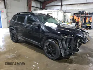 2017 Jeep Cherokee Altitude with VIN 1C4PJMAS2HW587409, listed as a Copart auction lot 88558155 with 111,788 mi miles and Salvage title. Bid and sale history available at DreamBid. Image 4.