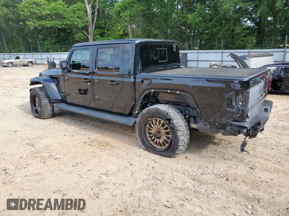 2021 Jeep Gladiator High Altitude with VIN 1C6HJTFGXML570864, listed as a Copart auction lot 56964975 with 67,538 mi miles and Salvage title. Bid and sale history available at DreamBid. Image 2.