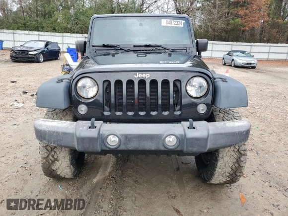 2015 Jeep Wrangler Sport with VIN 1C4AJWAG7FL576076, listed as a Copart auction lot 84072324 with 100,119 mi miles and Salvage Title. Bid and sale history available at carsss.com. Image 5.