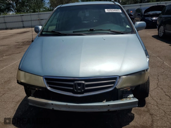 2004 Honda Odyssey EX-L with VIN 5FNRL18014B015462, listed as a Copart auction lot 62834665 with 323,817 mi miles and Salvage title. Bid and sale history available at DreamBid. Image 5.