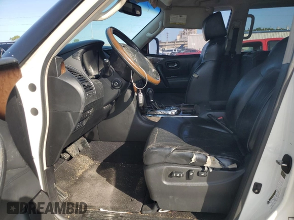 2012 Infiniti QX56 8-passenger with VIN JN8AZ2ND7C9715587, listed as a Copart auction lot 64508345 with 217,786 mi miles and Salvage title. Bid and sale history available at DreamBid. Image 7.