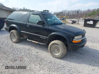 2000 Chevrolet Blazer LS z VIN 1GNCT18W1YK112722, wystawiony jako IAAI lot #41758275 z przebiegiem 157 730 mil mil oraz . Historia ofert i sprzedaży dostępna na DreamBid. Obrazek 1.