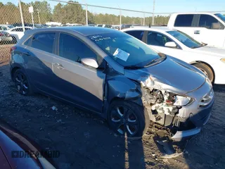 2013 Hyundai Elantra GT with VIN KMHD35LE9DU136411, listed as a IAAI auction lot 41279533 with 158,004 mi miles. Bid and sale history available at carsss.com. Image 1.